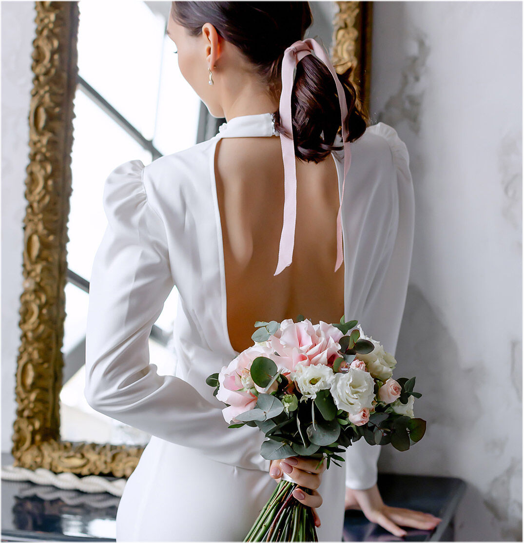 Foto de mujer elegante vestida de novia